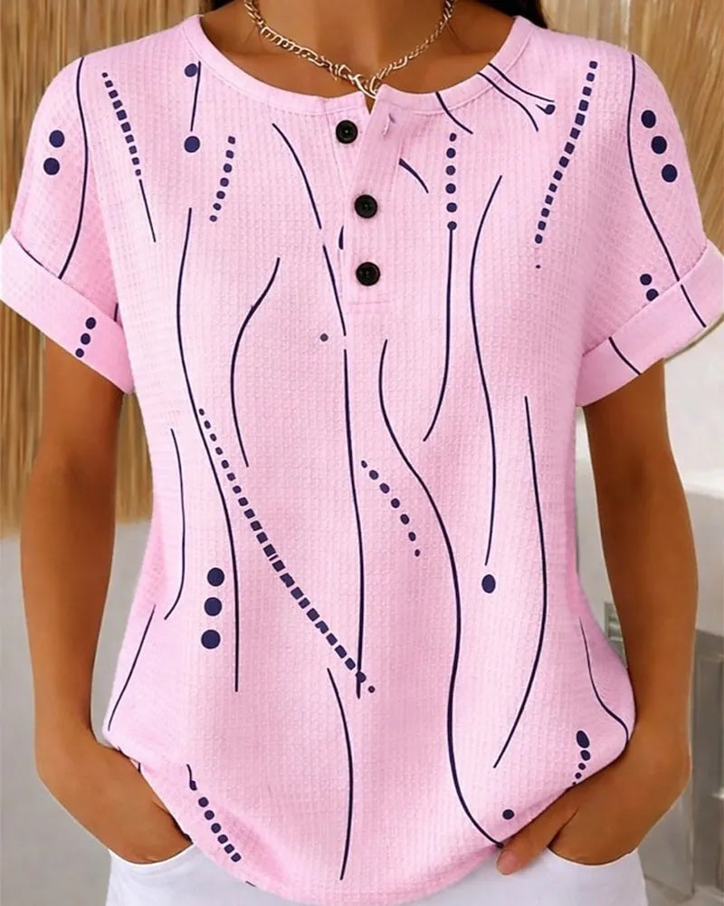 T-shirt donna rosa con bottoni e stampa grafica
