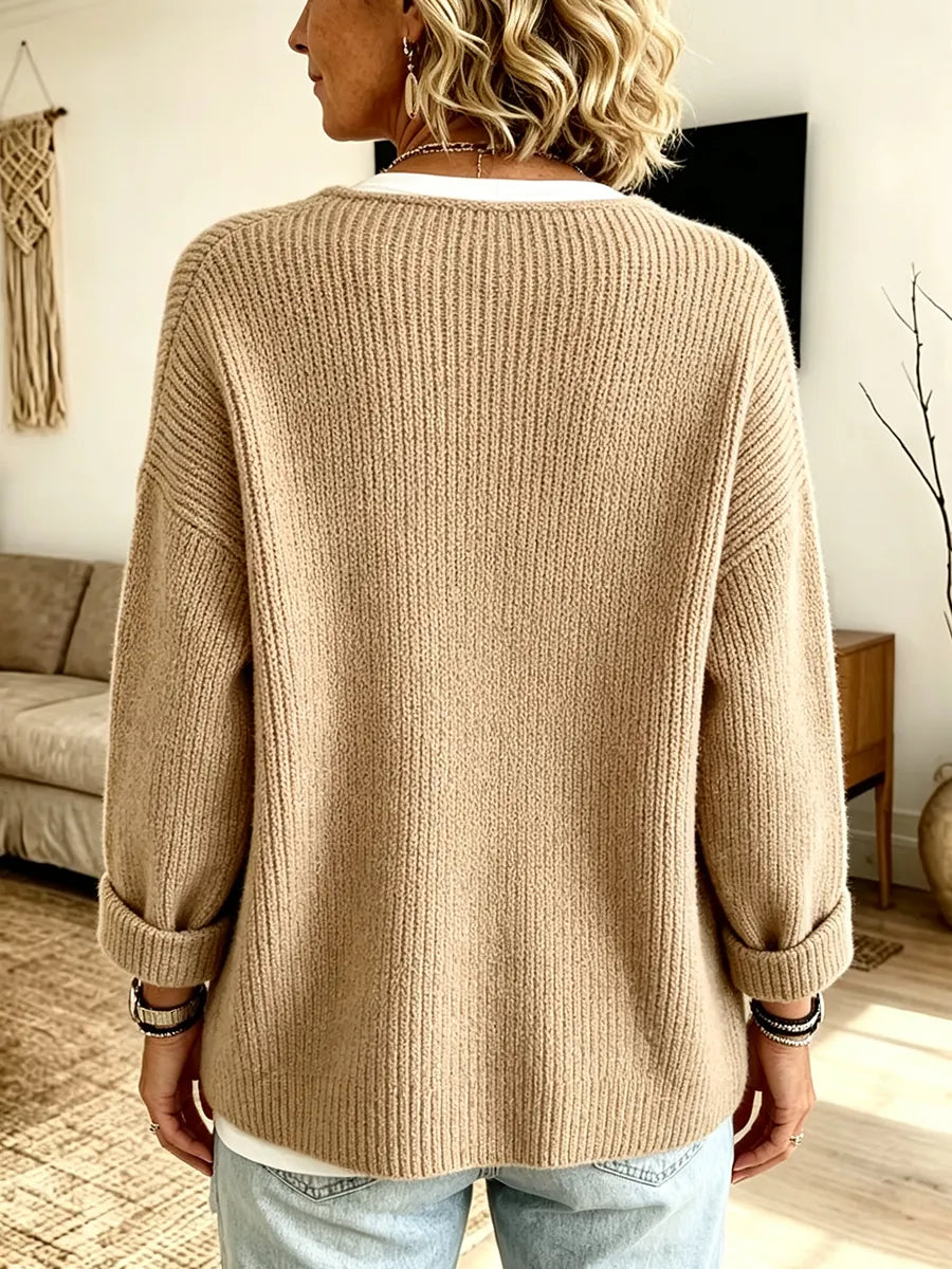 Cardigan donna asimmetrico in maglia a coste con bottoni