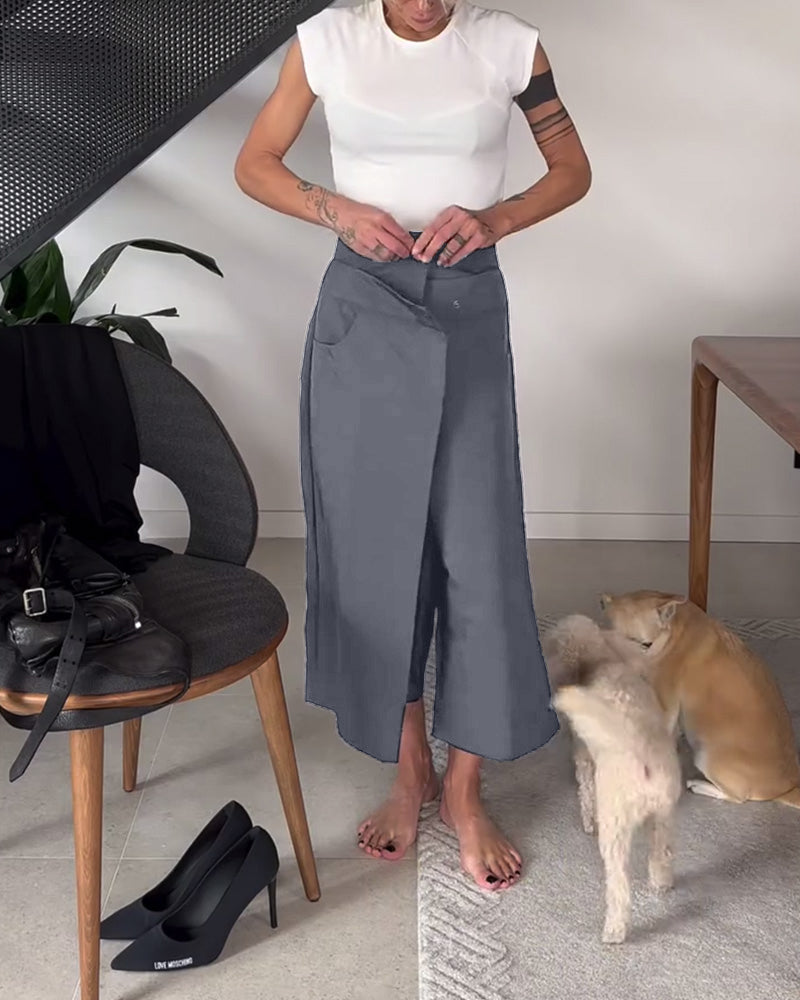 Pantaloni donna larghi asimmetrici con vita media