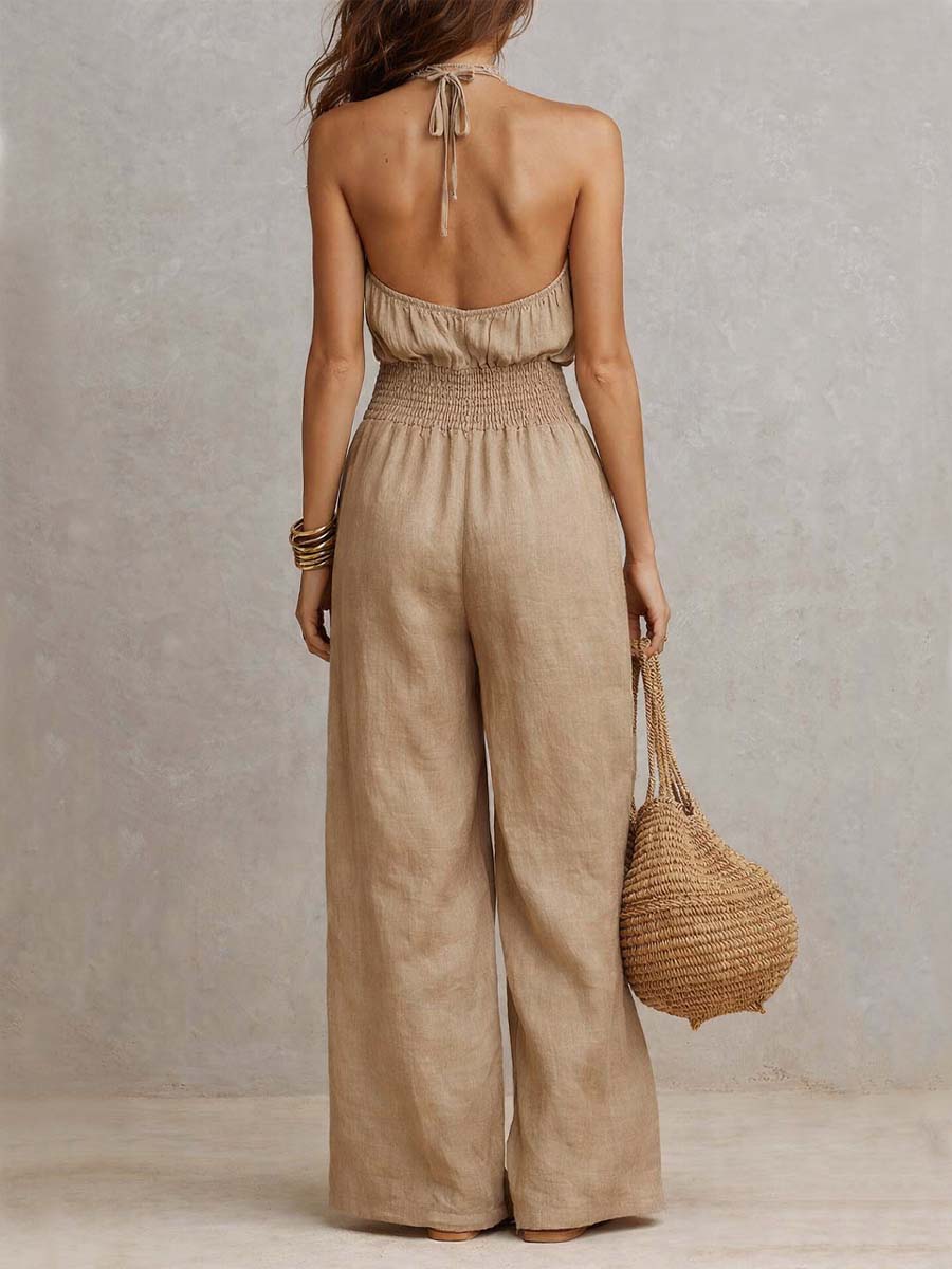 Tuta donna elegante con scollo halter e pantaloni larghi