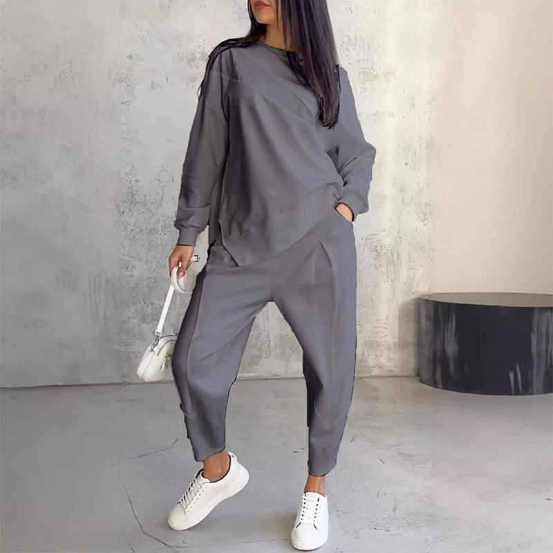 Completo donna con felpa asimmetrica e pantaloni comodi