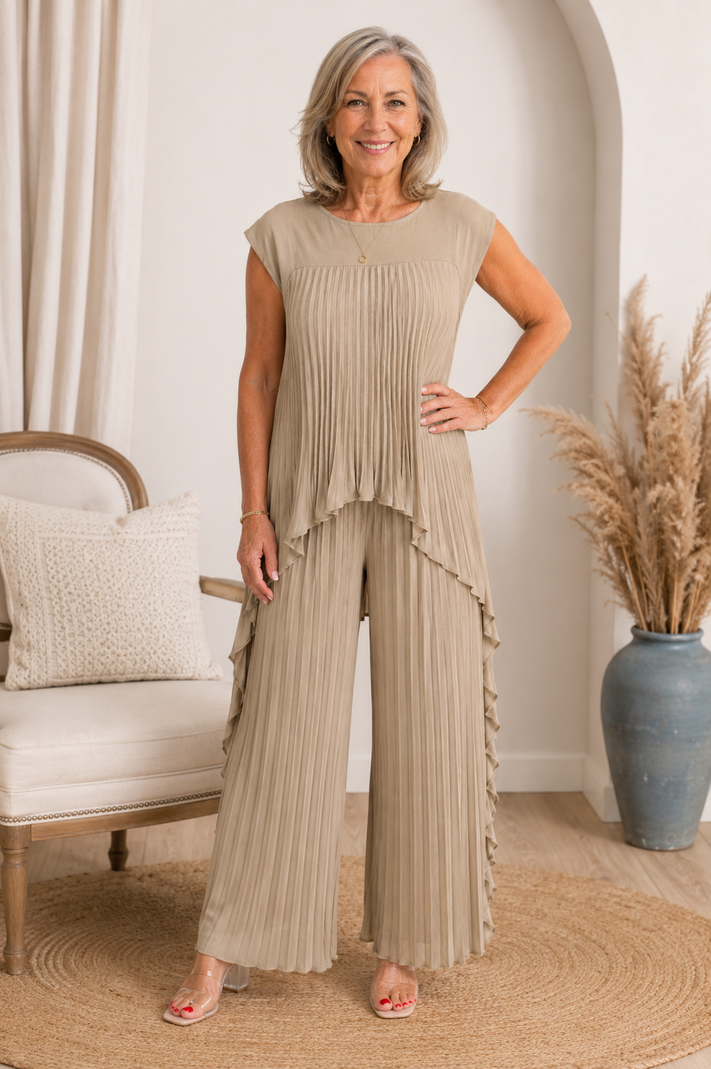 Completo donna plissettato con top asimmetrico e pantaloni larghi