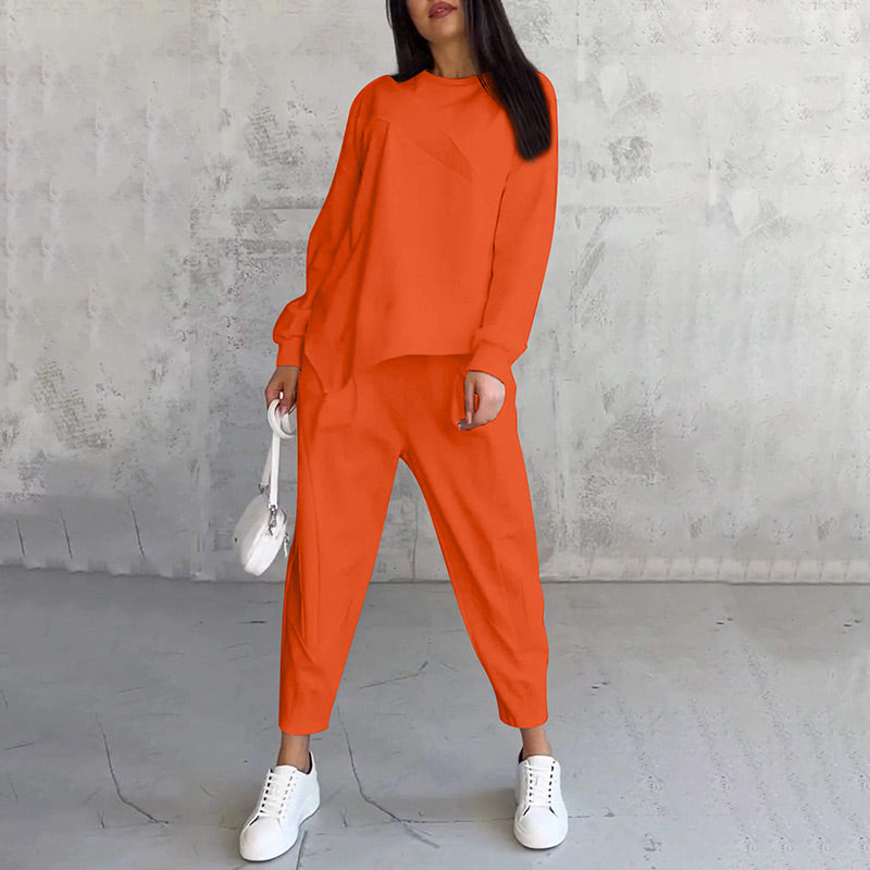 Completo donna con felpa asimmetrica e pantaloni comodi