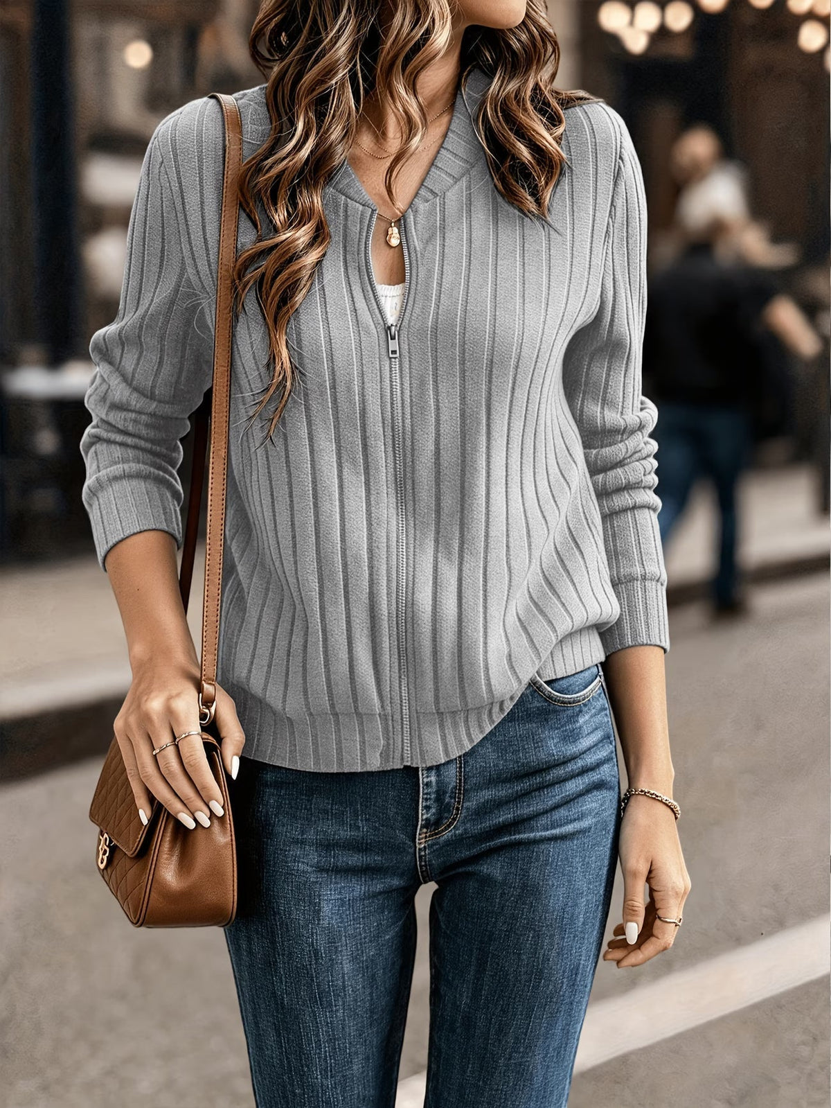 Cardigan donna a coste con zip frontale e maniche lunghe