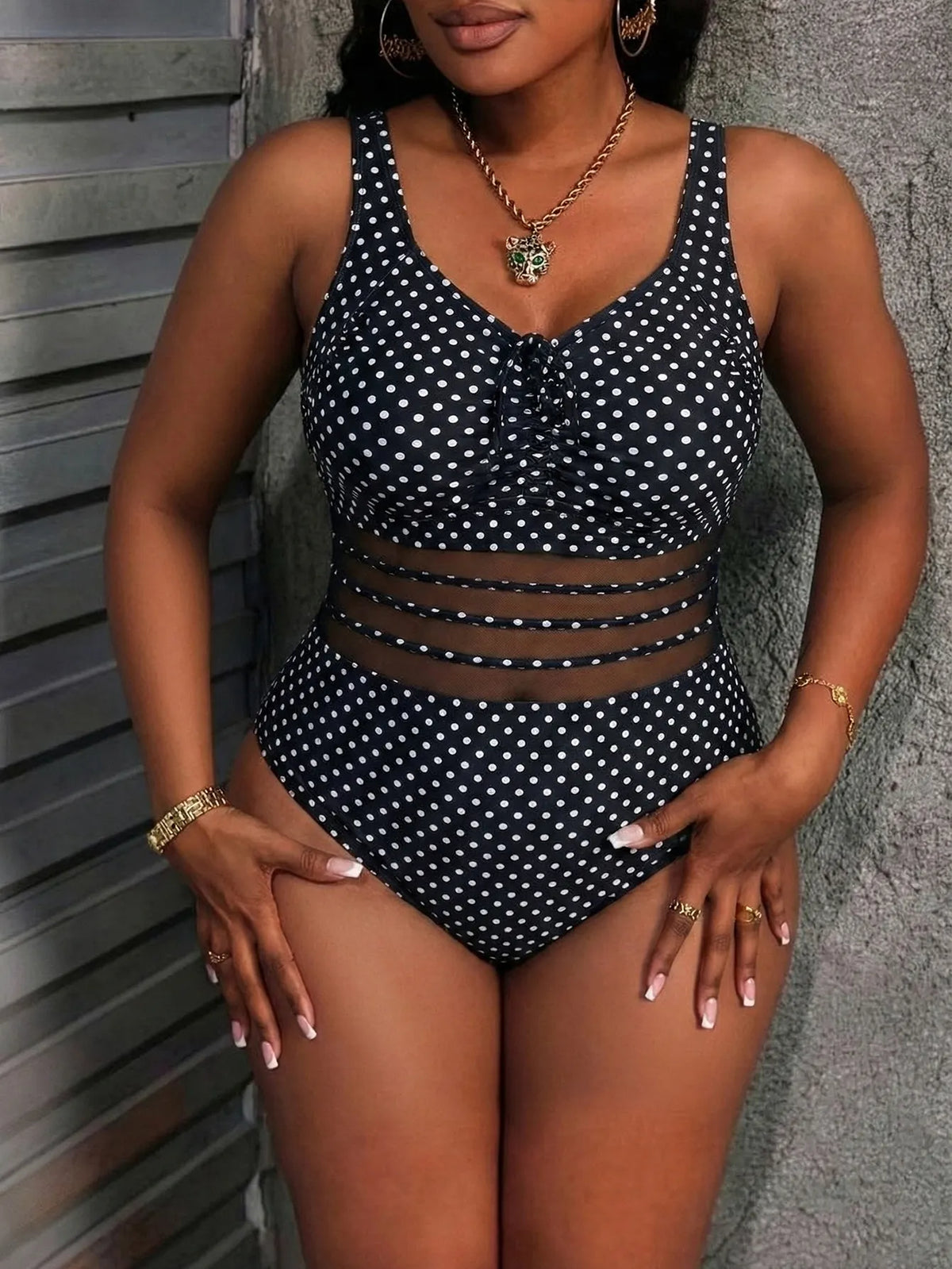 Costume da bagno intero donna con stampa palme e inserti in rete