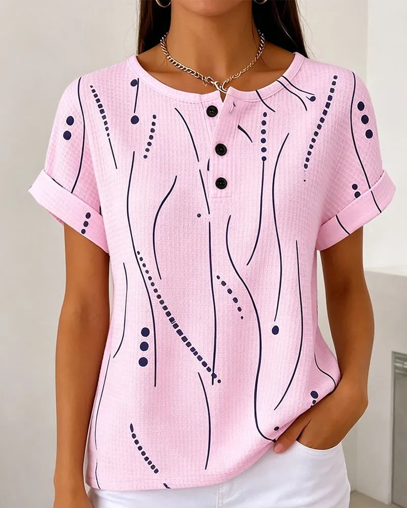 T-shirt donna rosa con bottoni e stampa grafica