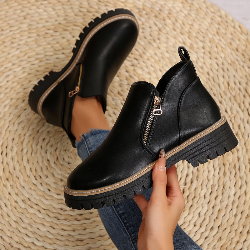 Stivaletti donna con zip laterale e suola platform