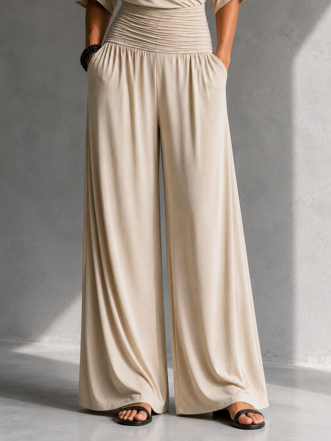 Tuta donna elegante con scollo a V incrociato