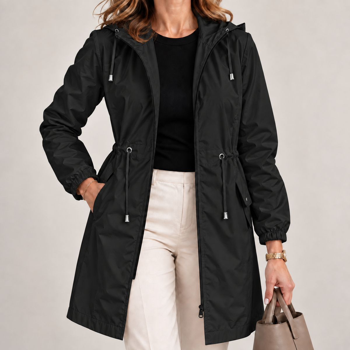 Parka donna impermeabile con cappuccio e vita regolabile