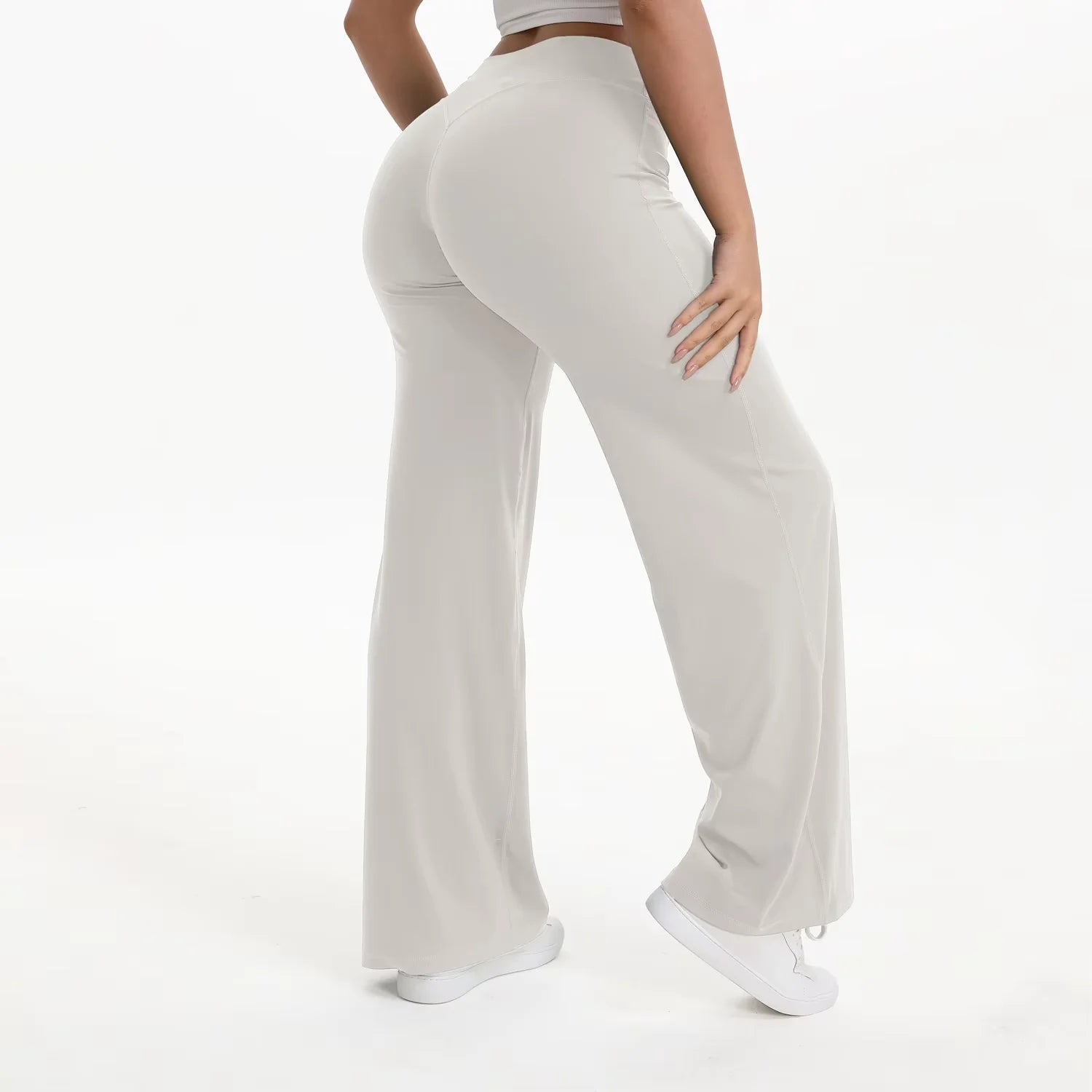 Pantaloni yoga donna a vita alta con gamba ampia