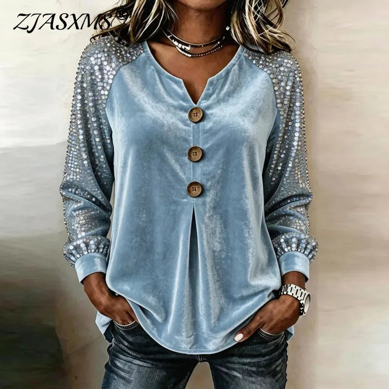 Top donna effetto velluto con paillettes e bottoni decorativi