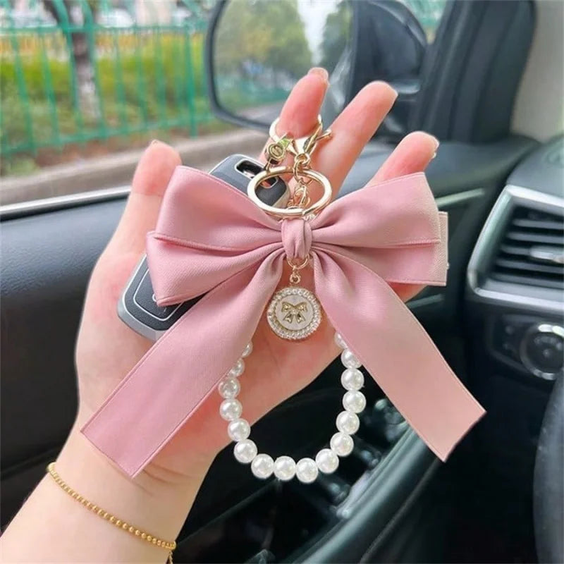 Laccetto telefono donna con perline macaron e fiore