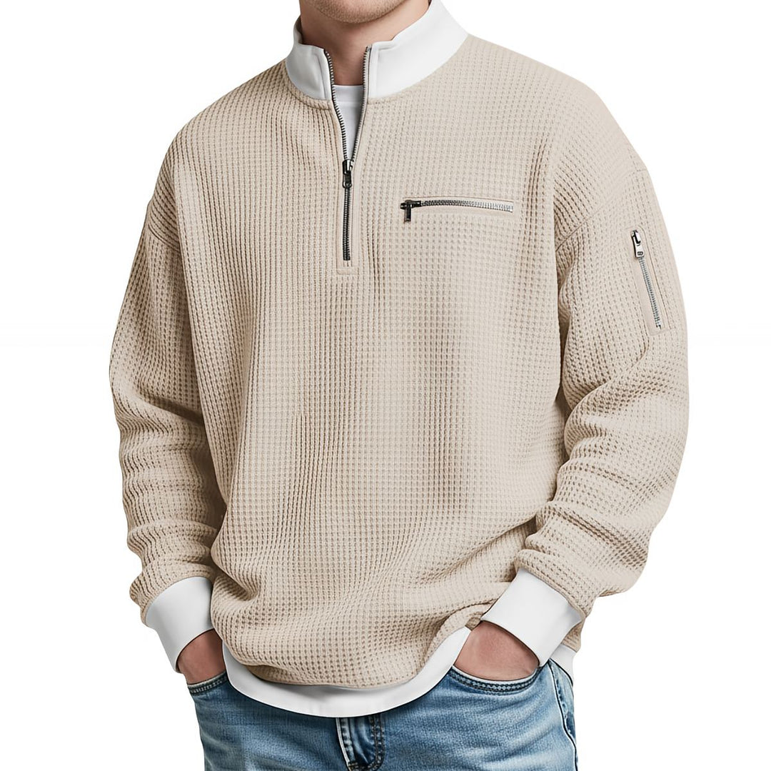 Maglione uomo waffle con mezza zip e tasche con cerniera
