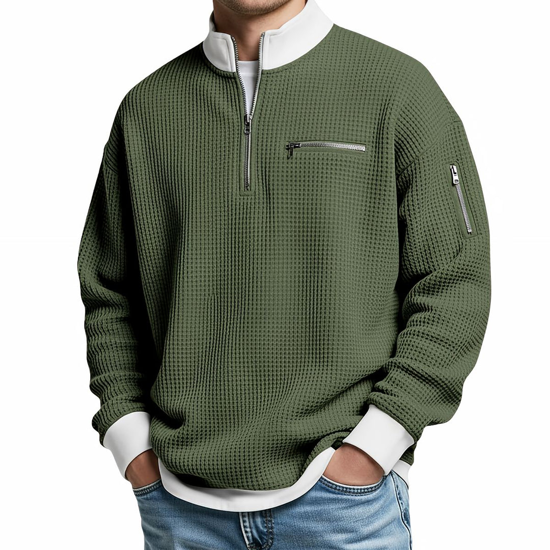 Maglione uomo waffle con mezza zip e tasche con cerniera
