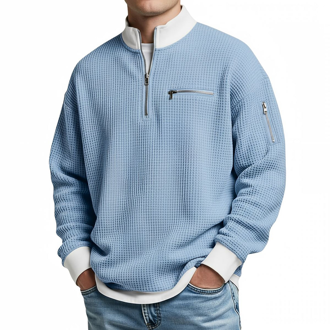 Maglione uomo waffle con mezza zip e tasche con cerniera