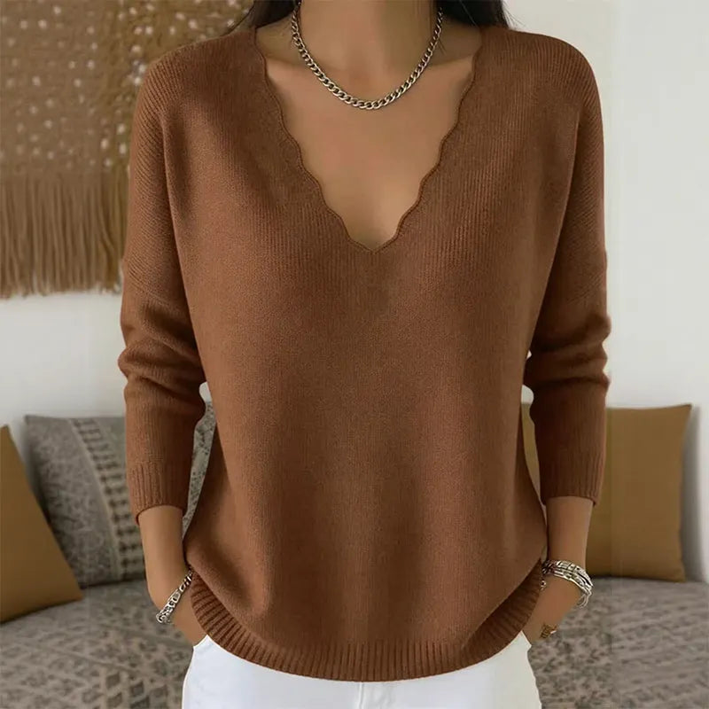 Maglione donna con scollo a V e bordo ondulato