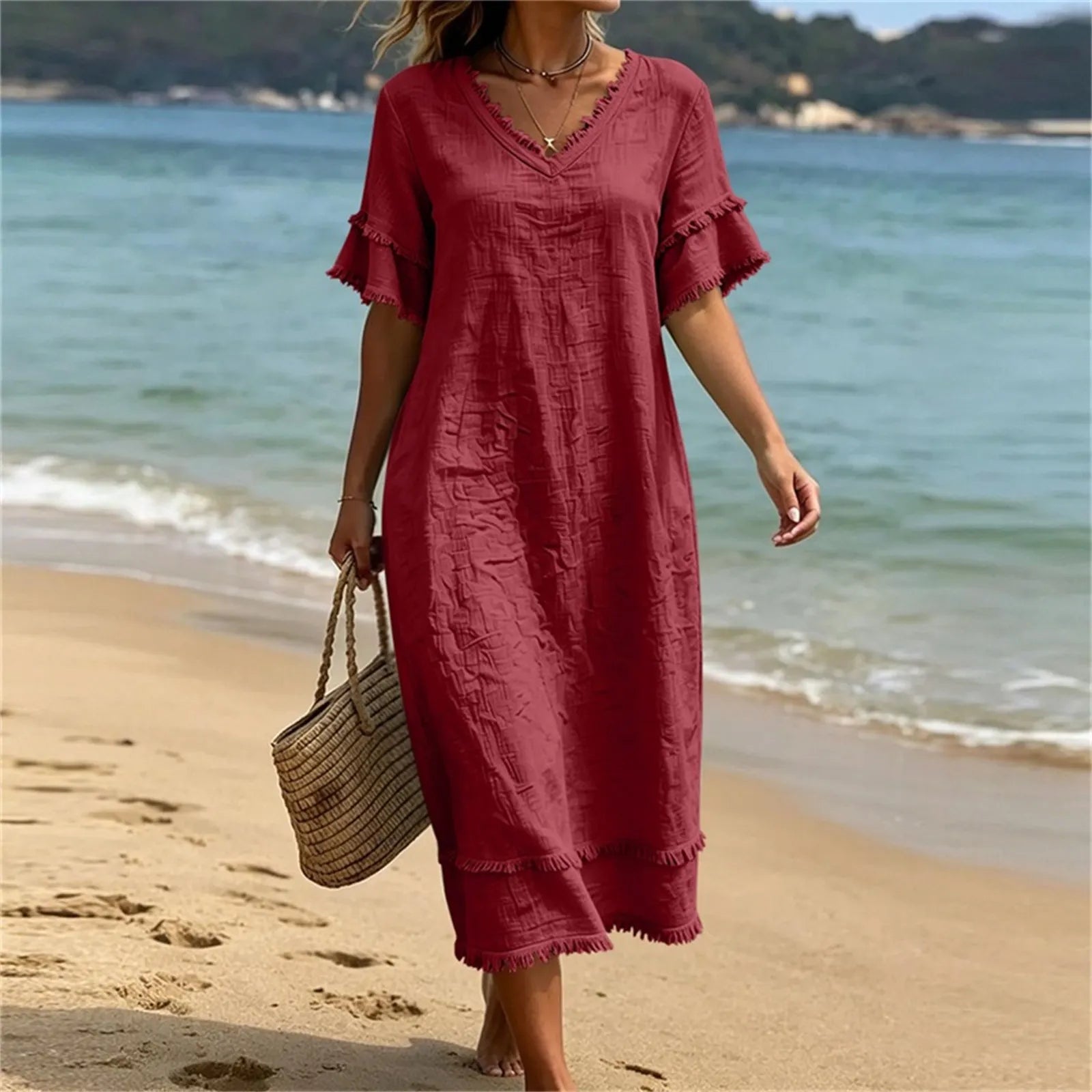 Abito donna bohémien con scollo a V e frange
