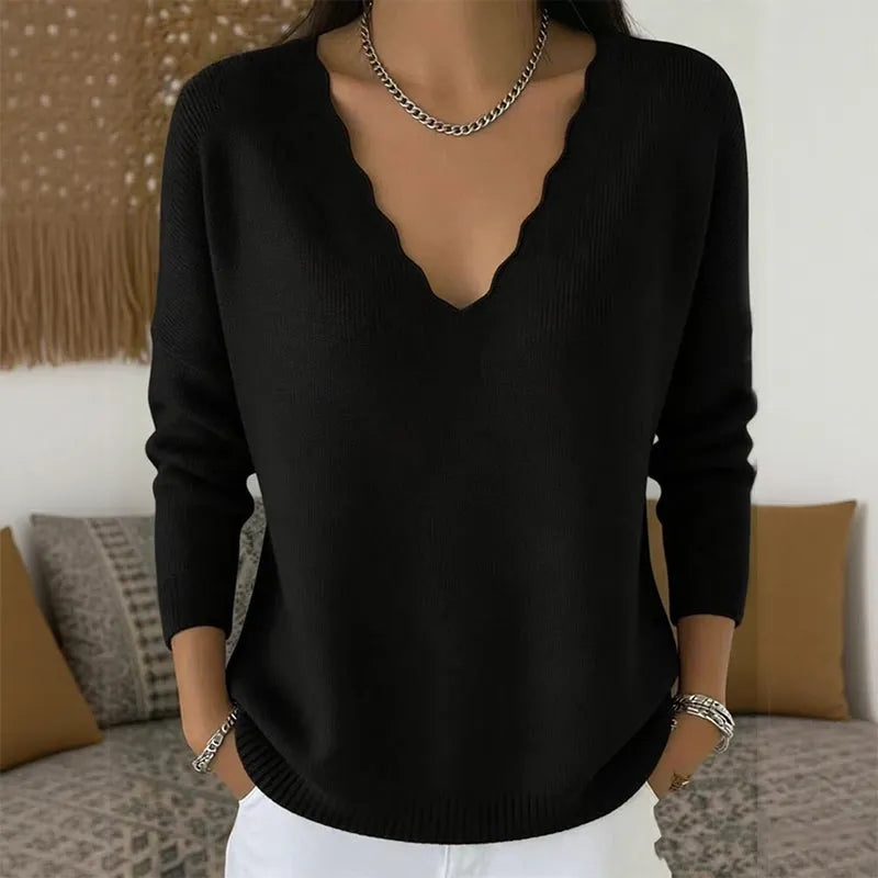 Maglione donna con scollo a V e bordo ondulato