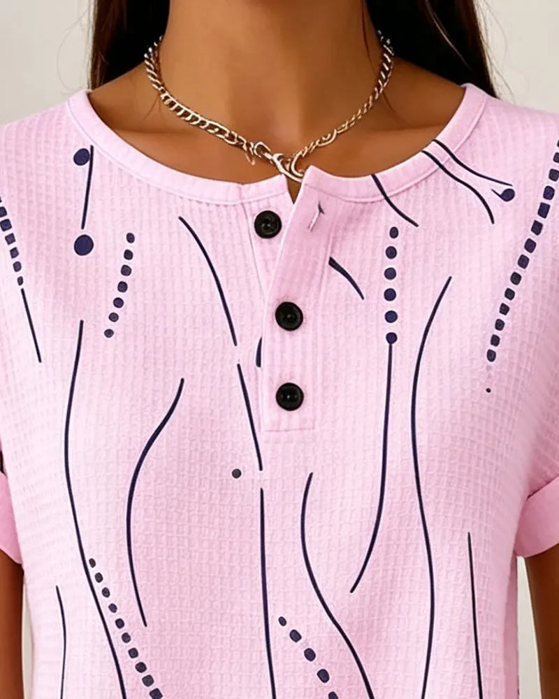 T-shirt donna rosa con bottoni e stampa grafica