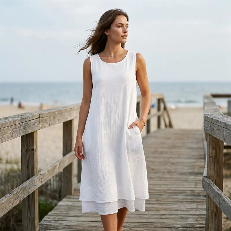 Abito midi smanicato donna con fondo a balza