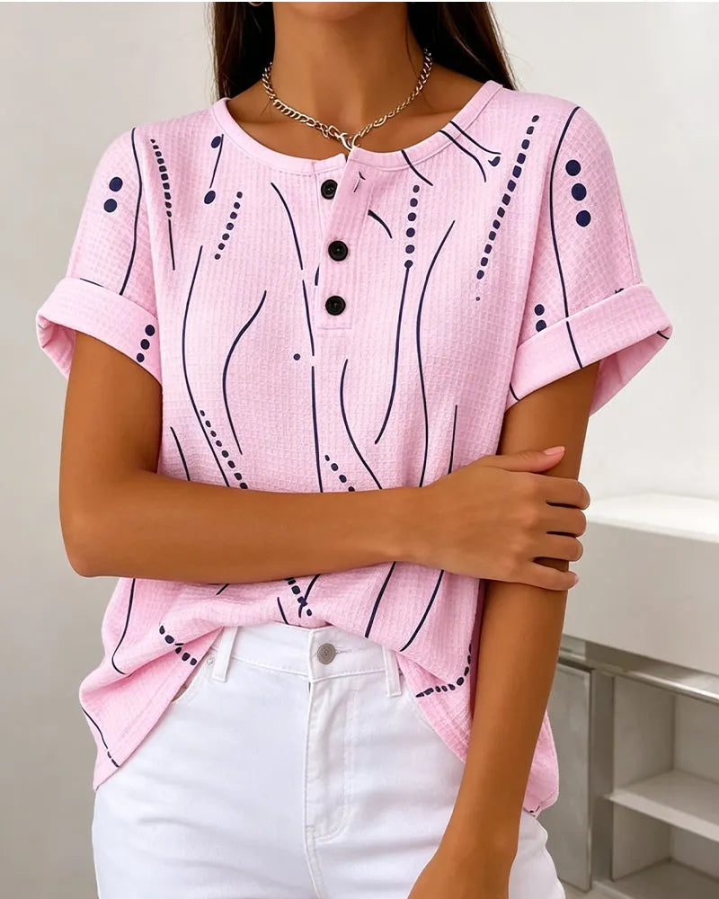 T-shirt donna rosa con bottoni e stampa grafica