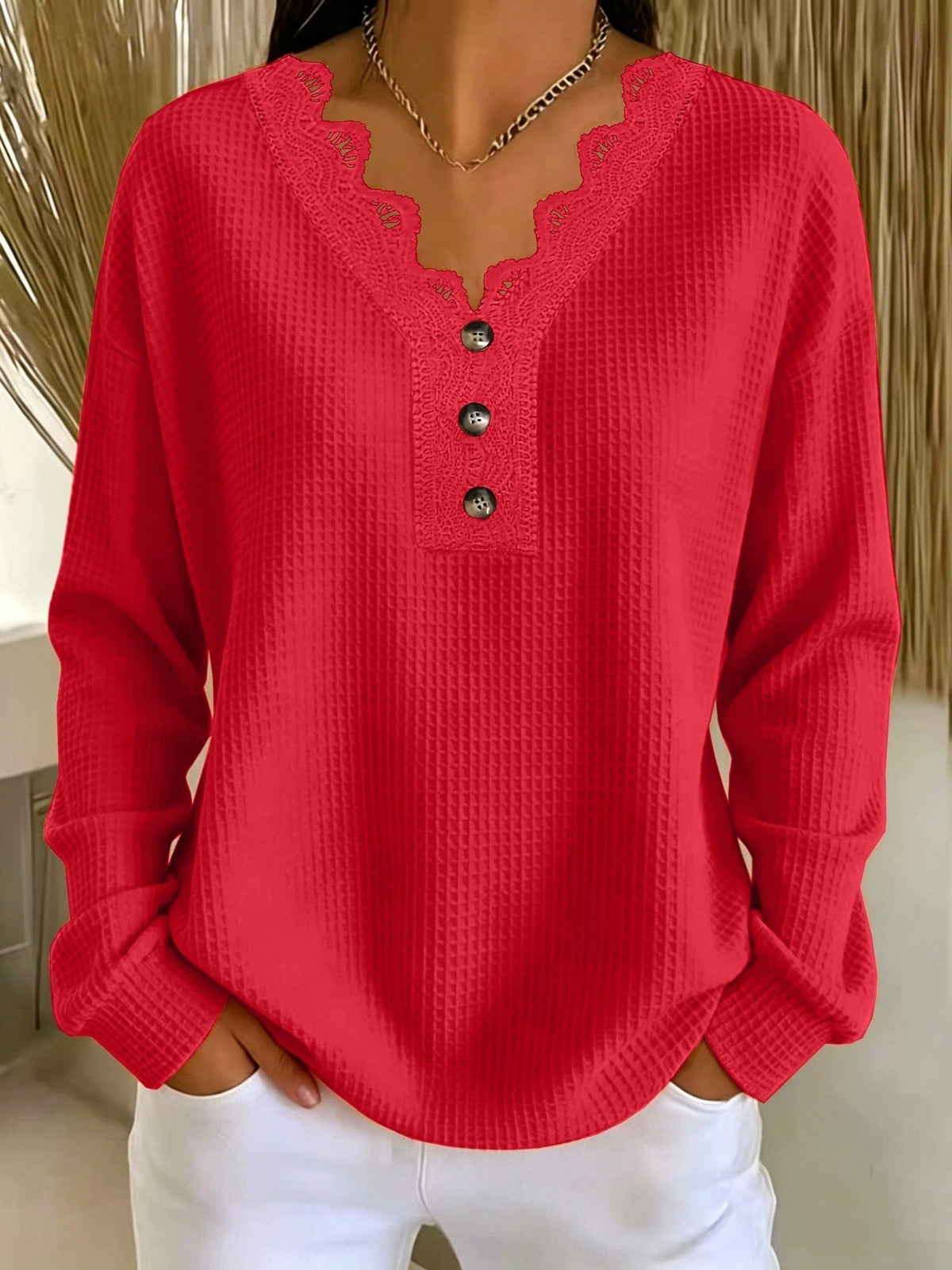 Top donna testurizzato con scollo a V in pizzo