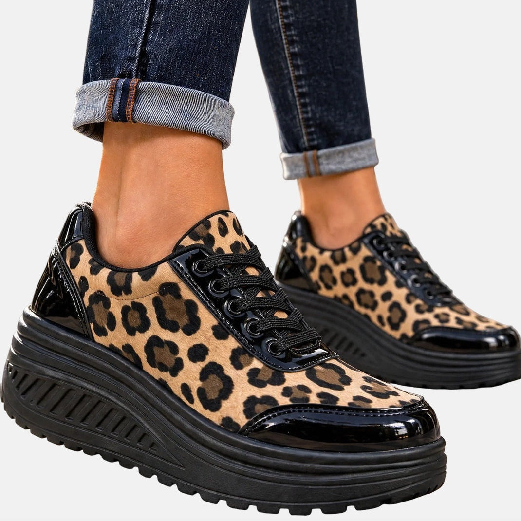 Sneakers donna con zeppa platform e stampa leopardata