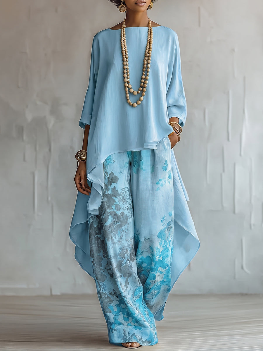 Completo donna boho con blusa asimmetrica e pantaloni floreali