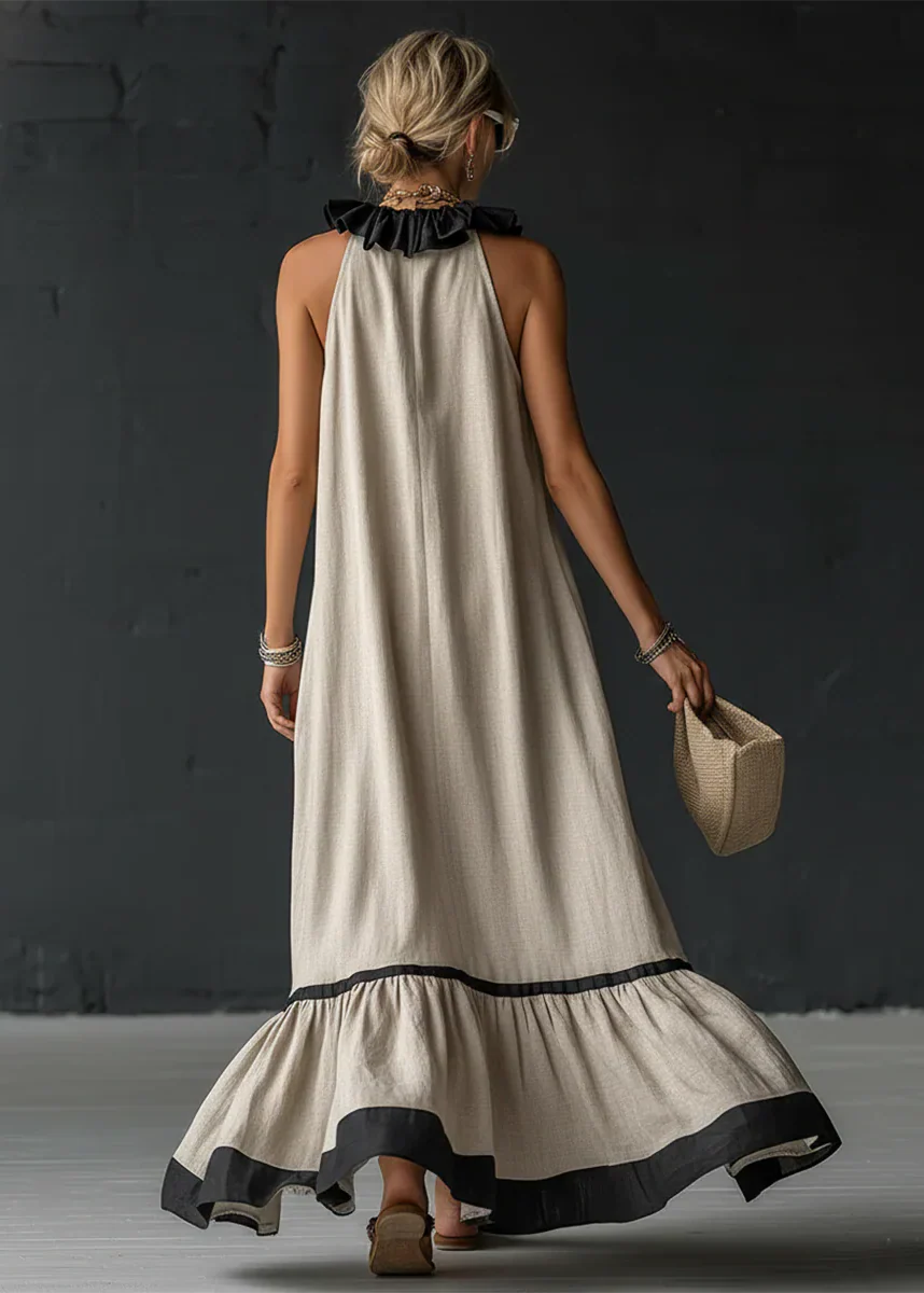 Abito lungo da donna fluido con volant a contrasto chic