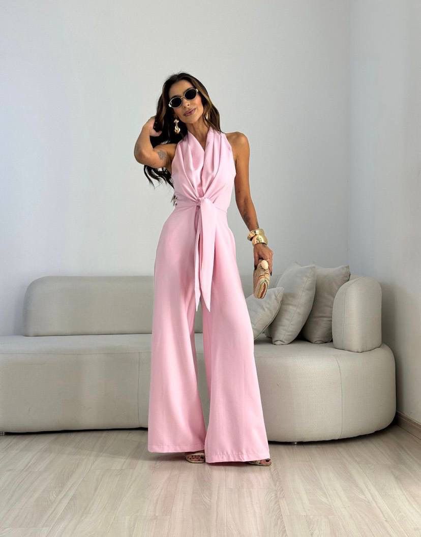Tuta donna elegante con scollo halter e pantaloni larghi
