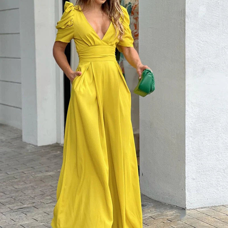 Tuta elegante da donna con scollo a V e palazzo