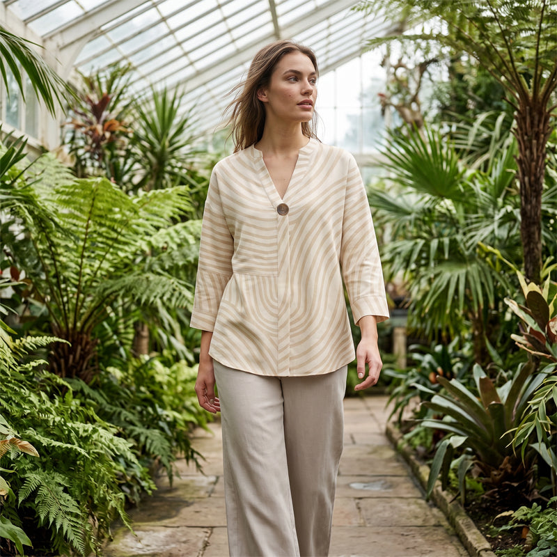 Completo donna a righe con pantaloni larghi