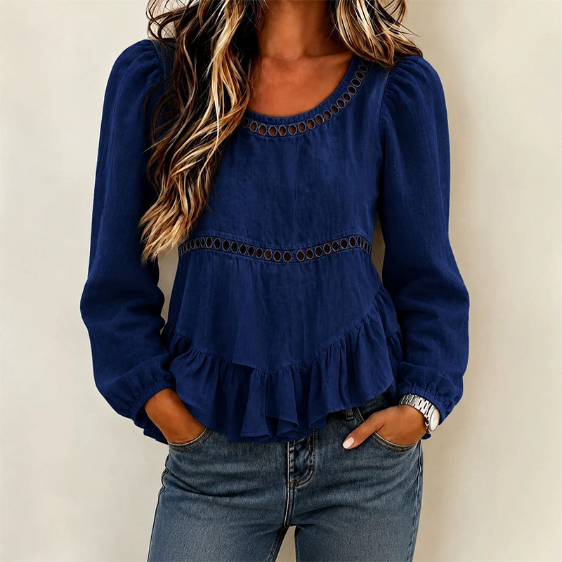 Blusa donna con maniche a sbuffo, volant e dettagli traforati