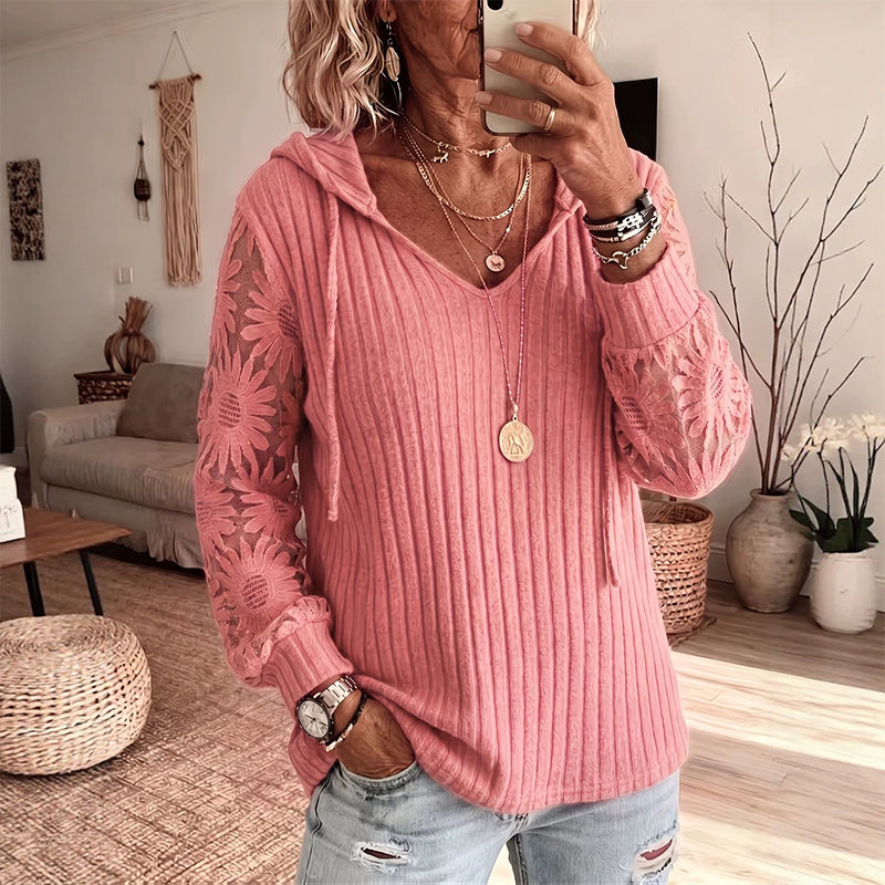Top donna con cappuccio e maniche in pizzo floreale