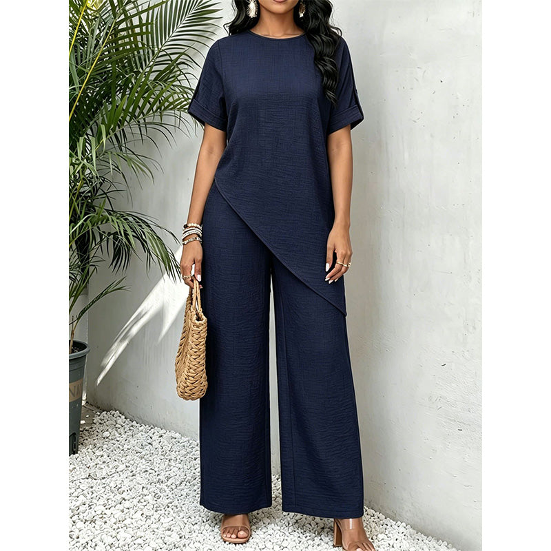 Completo donna due pezzi con top asimmetrico e pantaloni larghi