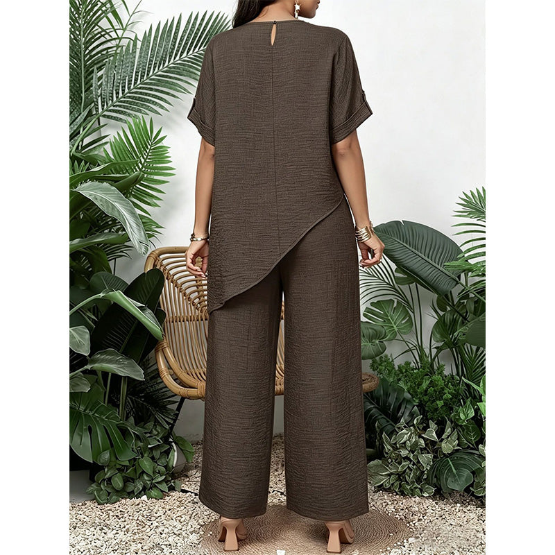 Completo donna due pezzi con top asimmetrico e pantaloni larghi