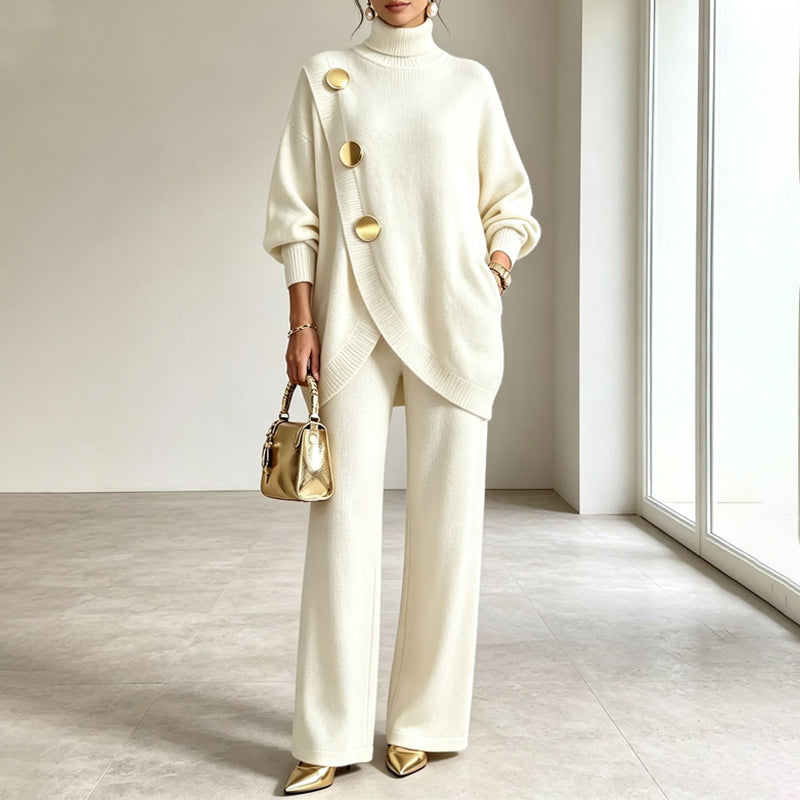 Completo donna in maglia con top asimmetrico e pantaloni palazzo