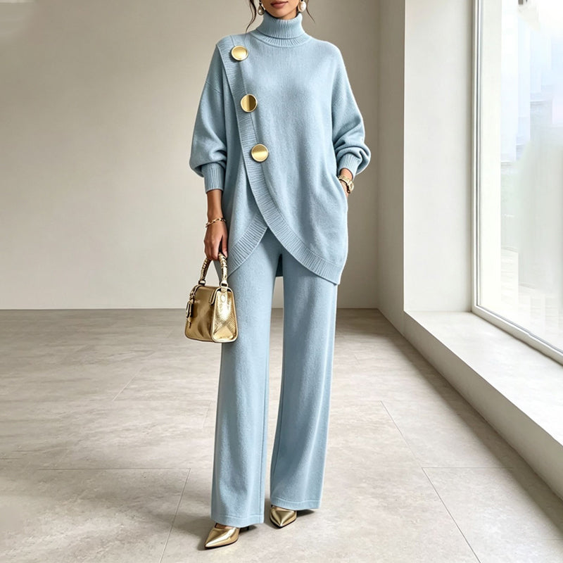 Completo donna in maglia con top asimmetrico e pantaloni palazzo