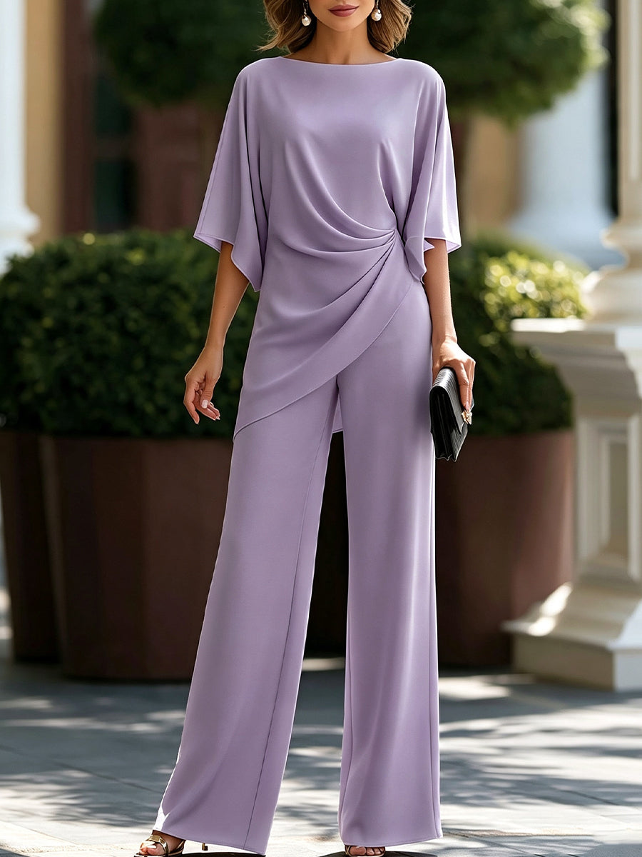 Completo donna elegante con top drappeggiato e pantaloni larghi