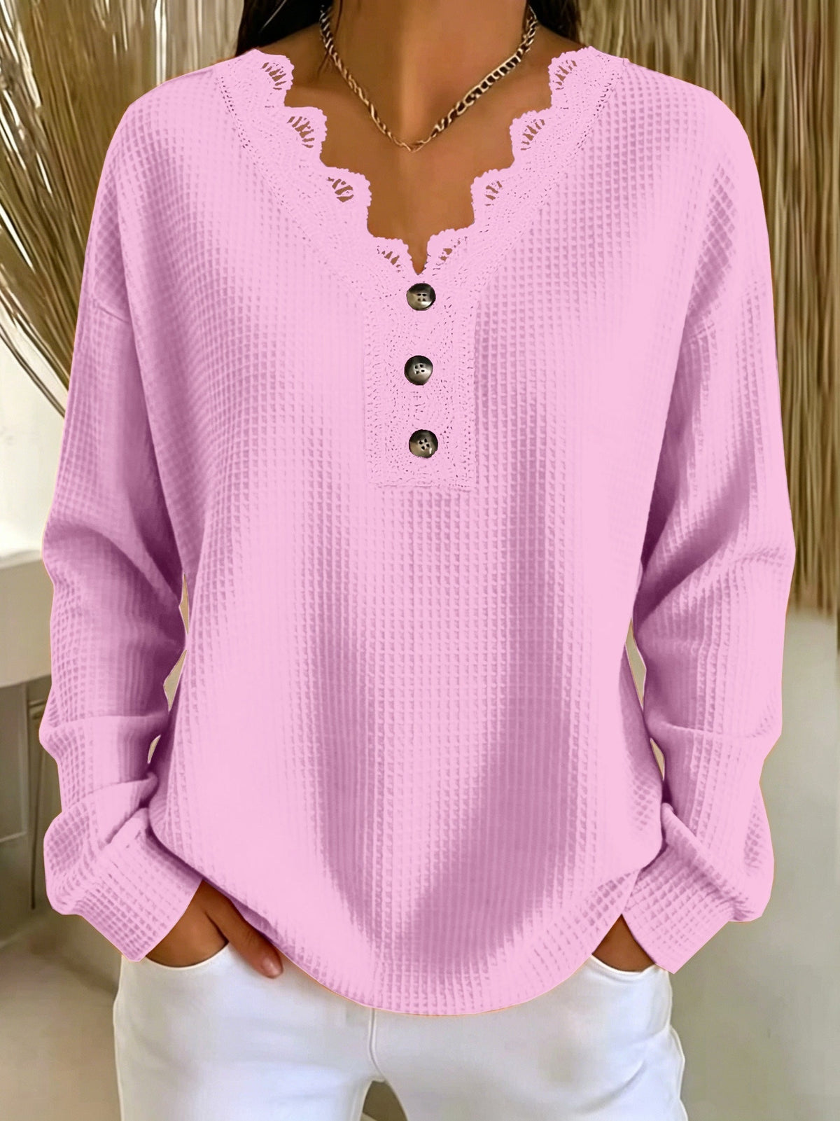 Top donna testurizzato con scollo a V in pizzo