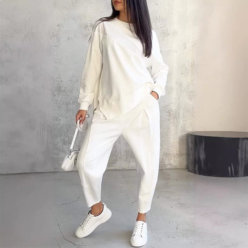 Completo donna con felpa asimmetrica e pantaloni comodi