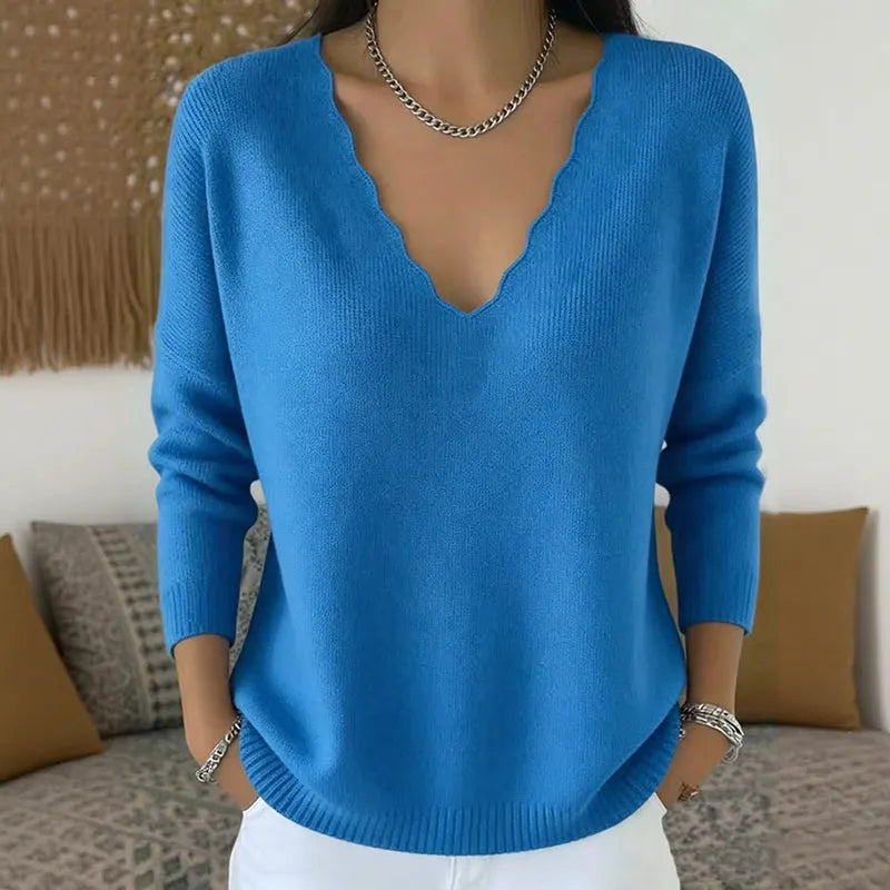 Maglione donna con scollo a V e bordo ondulato
