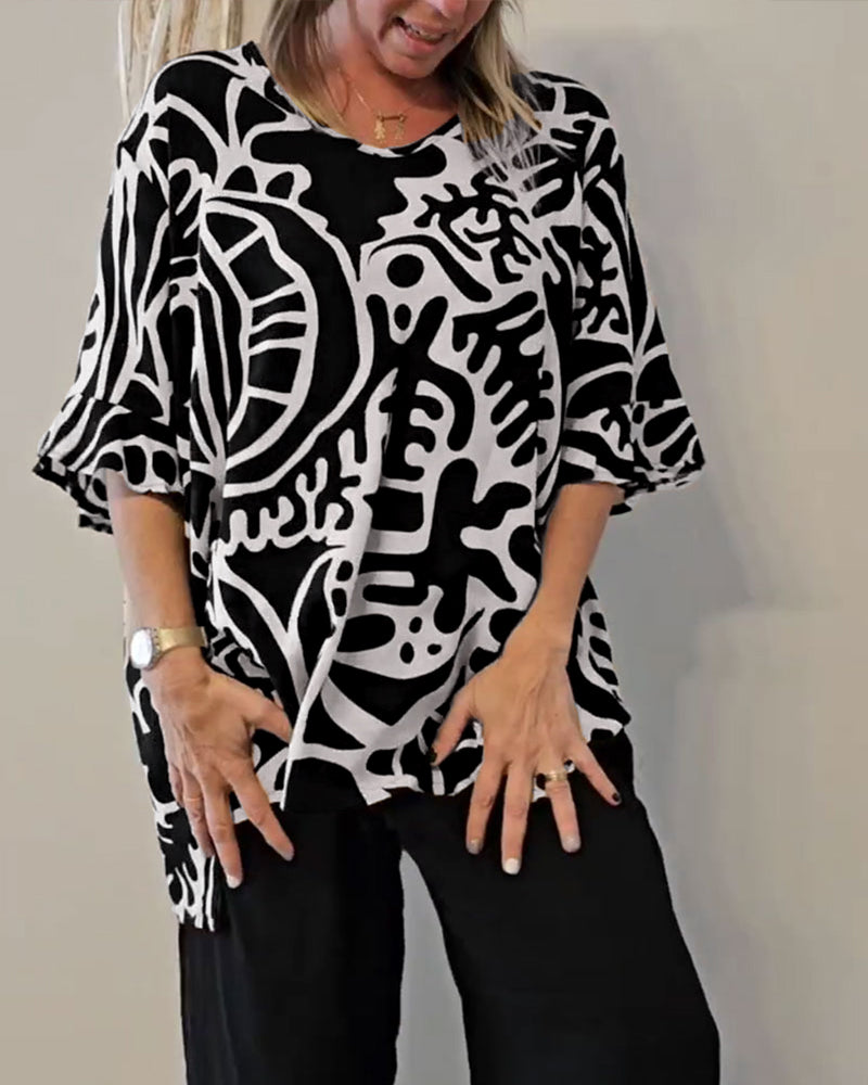 Top donna ampio con stampa astratta