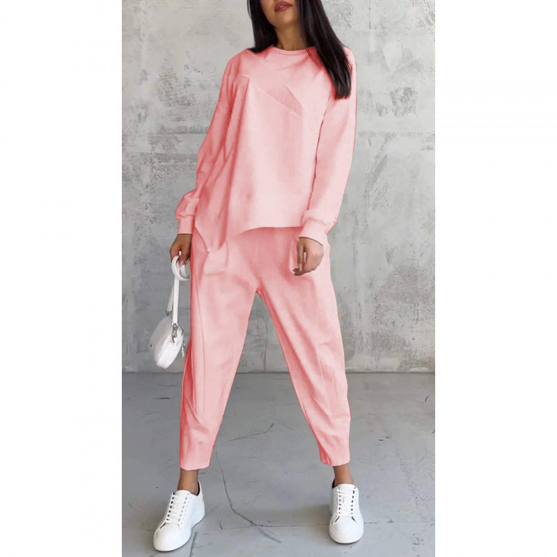 Completo donna con felpa asimmetrica e pantaloni comodi