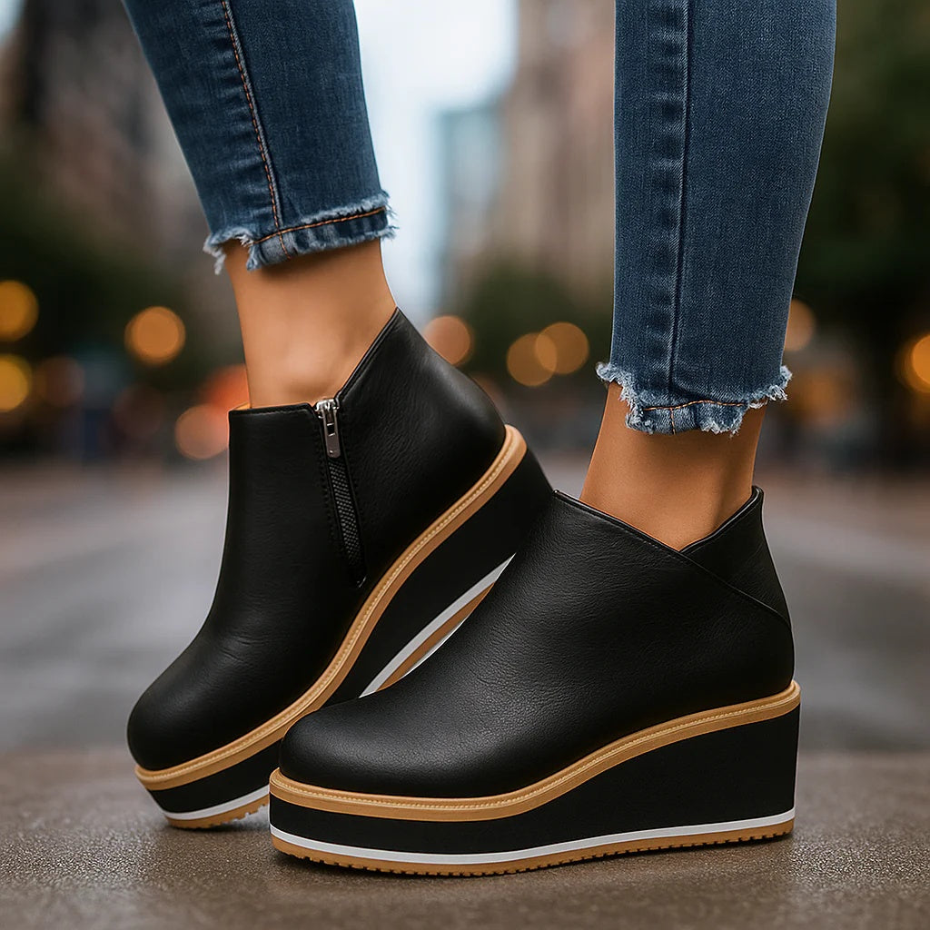Stivaletti donna con zeppa platform e chiusura zip laterale