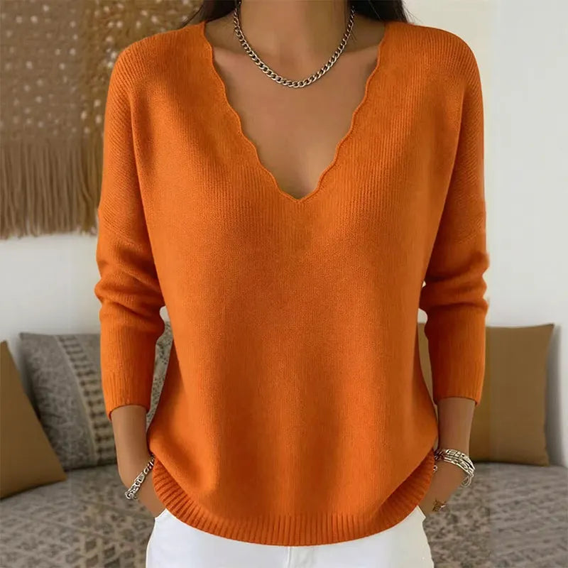 Maglione donna con scollo a V e bordo ondulato