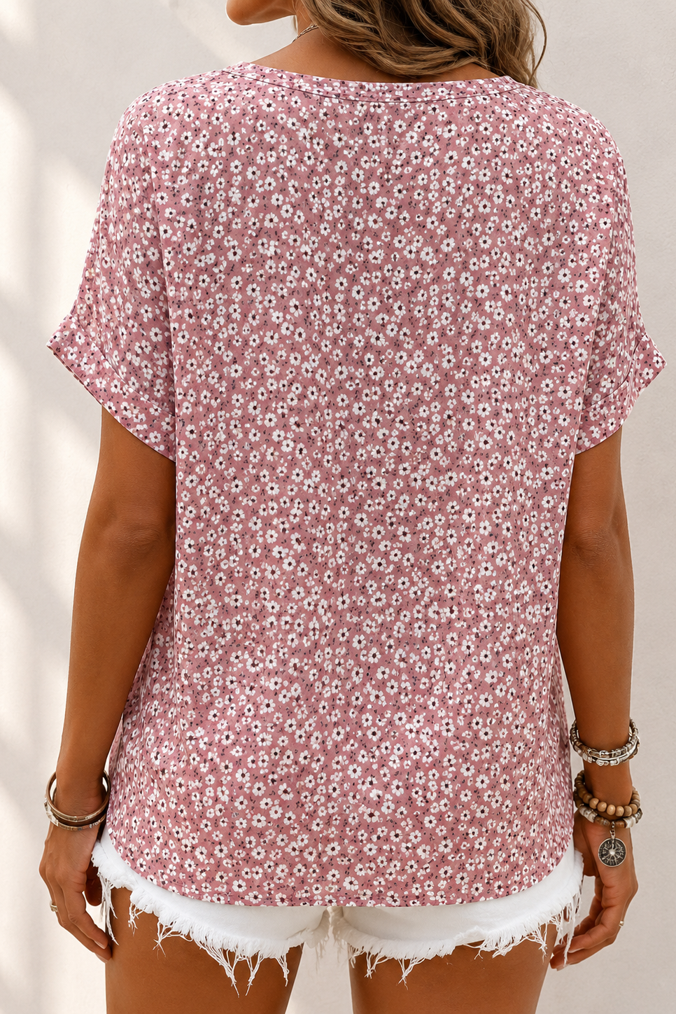 Blusa donna floreale con bottoni frontali
