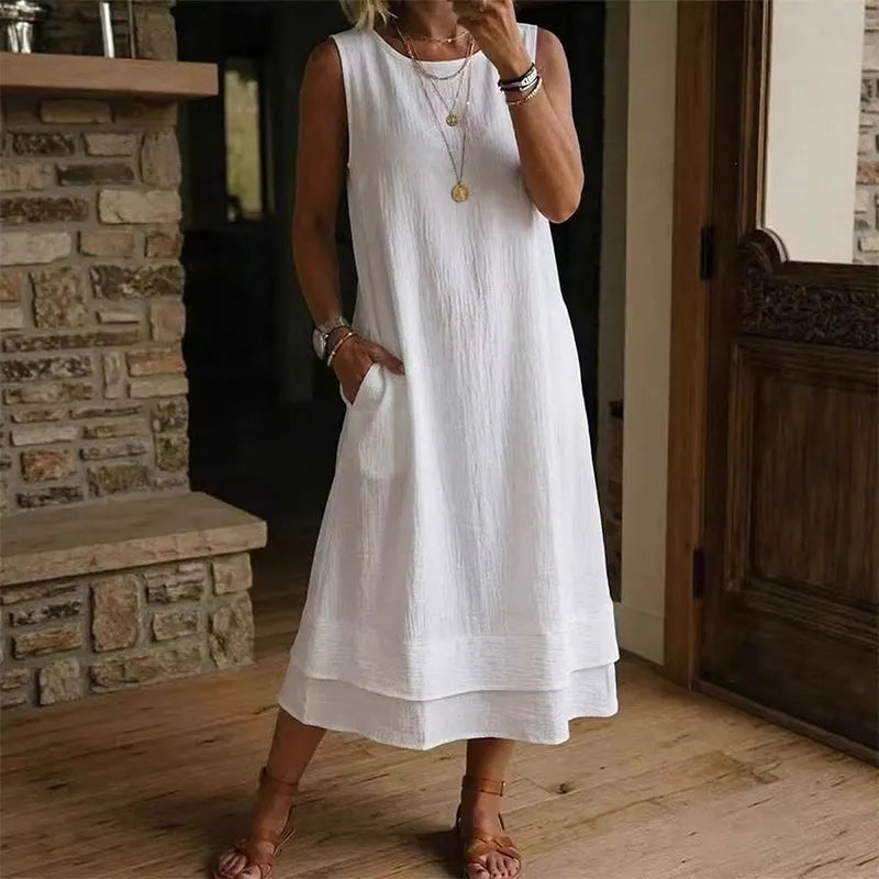 Abito midi smanicato donna con fondo a balza