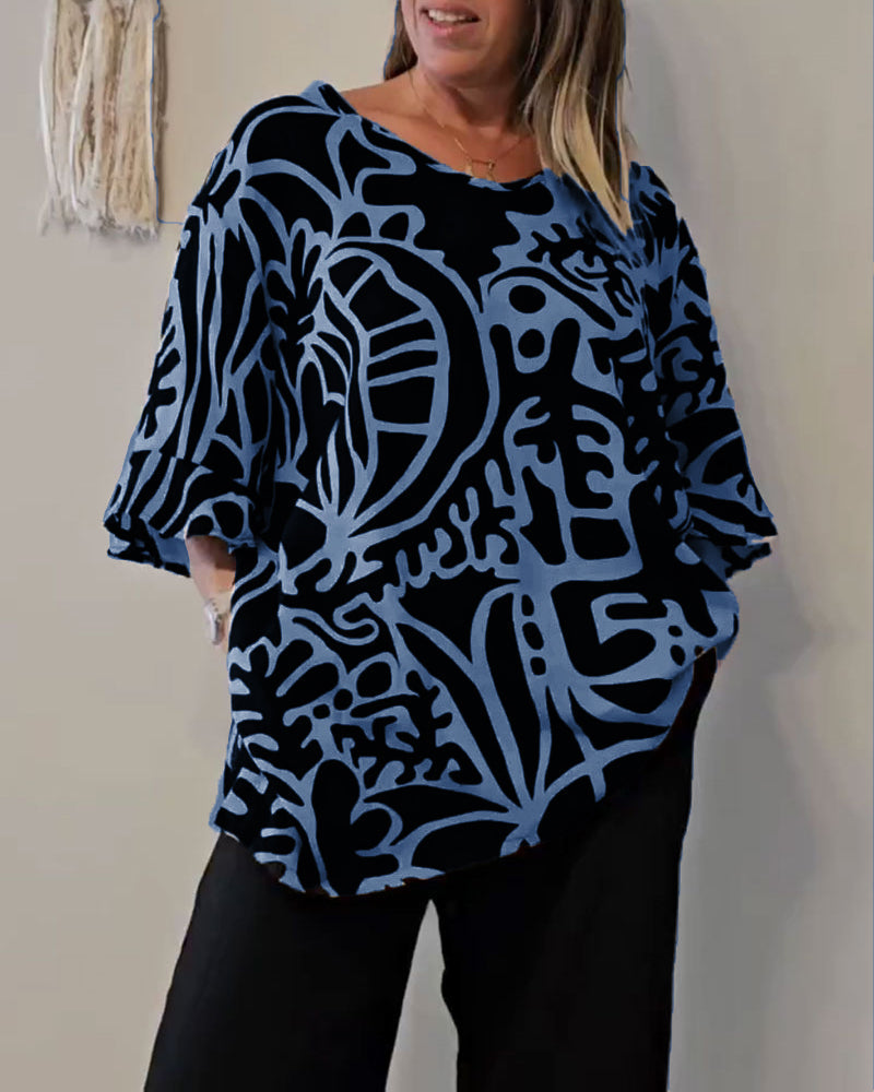 Top donna ampio con stampa astratta