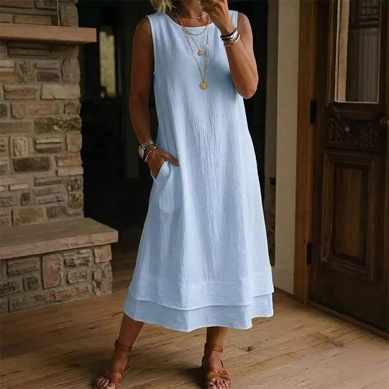 Abito midi smanicato donna con fondo a balza